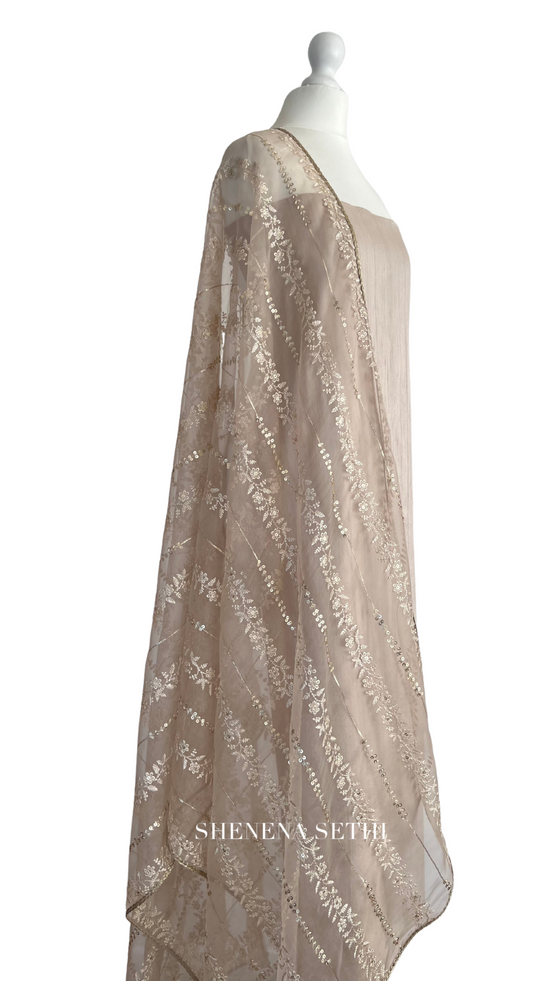 Unstitched fabric for kameez set. Loose semi raw silk kameez fabric, loose lycra pajami and readymade thread and sequin organza dupatta. Keep unstitched or made-to-measure by Shenena Sethi 