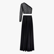 A black two-piece formal wear ensemble with bead work embroidery on the top and a georgette/satin lehenga. Designed by Shenena Sethi