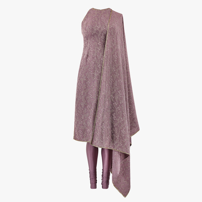 Thread and sequin kameez finished with an elegant gold border for a refined, elevated look. Paired with a matching fabric dupatta featuring a gold border and a comfortable lycra pajami, designed by Shenena Sethi