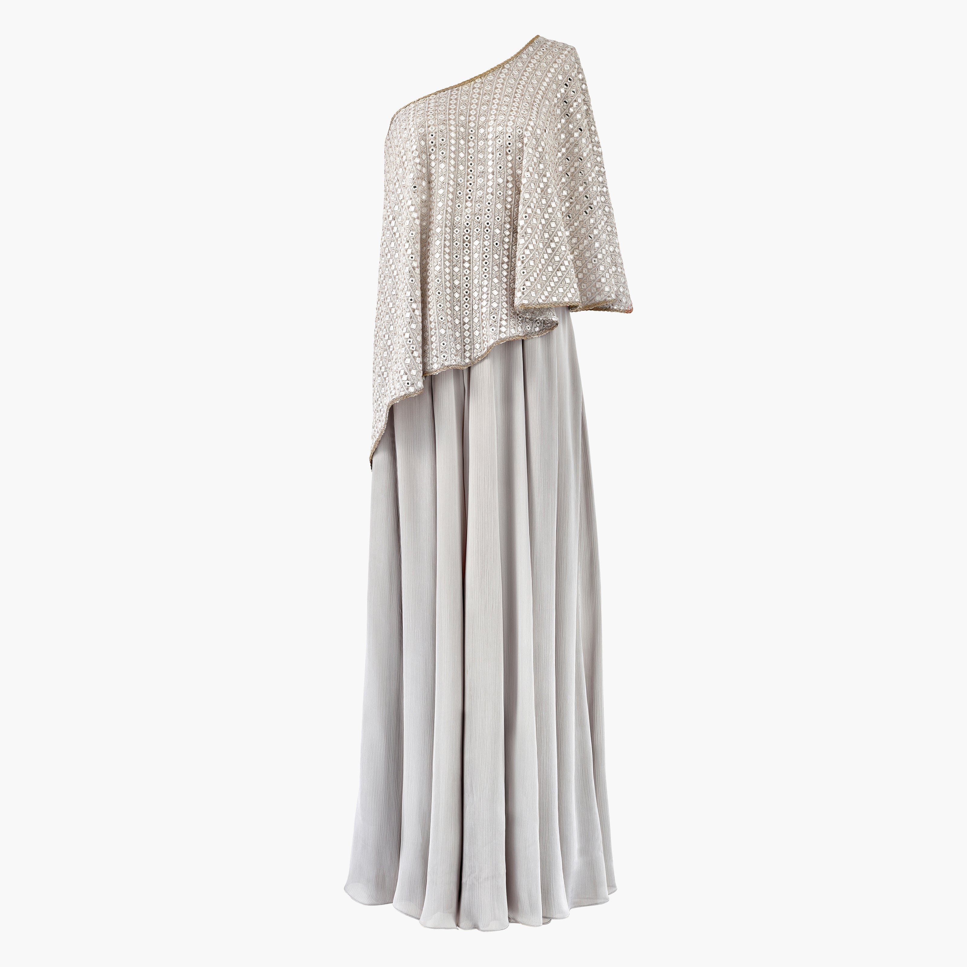 A one shoulder cape with thread and mirror detailing paired with a satin skirt, in grey. Customisable in colour.