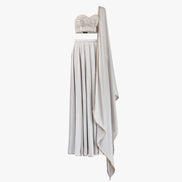 The Carlia lehenga set features a delicate mirror and chikan kari embellished bandeau top, Paired with a luxurious satin lehenga and matching dupatta, designed by Shenena Sethi