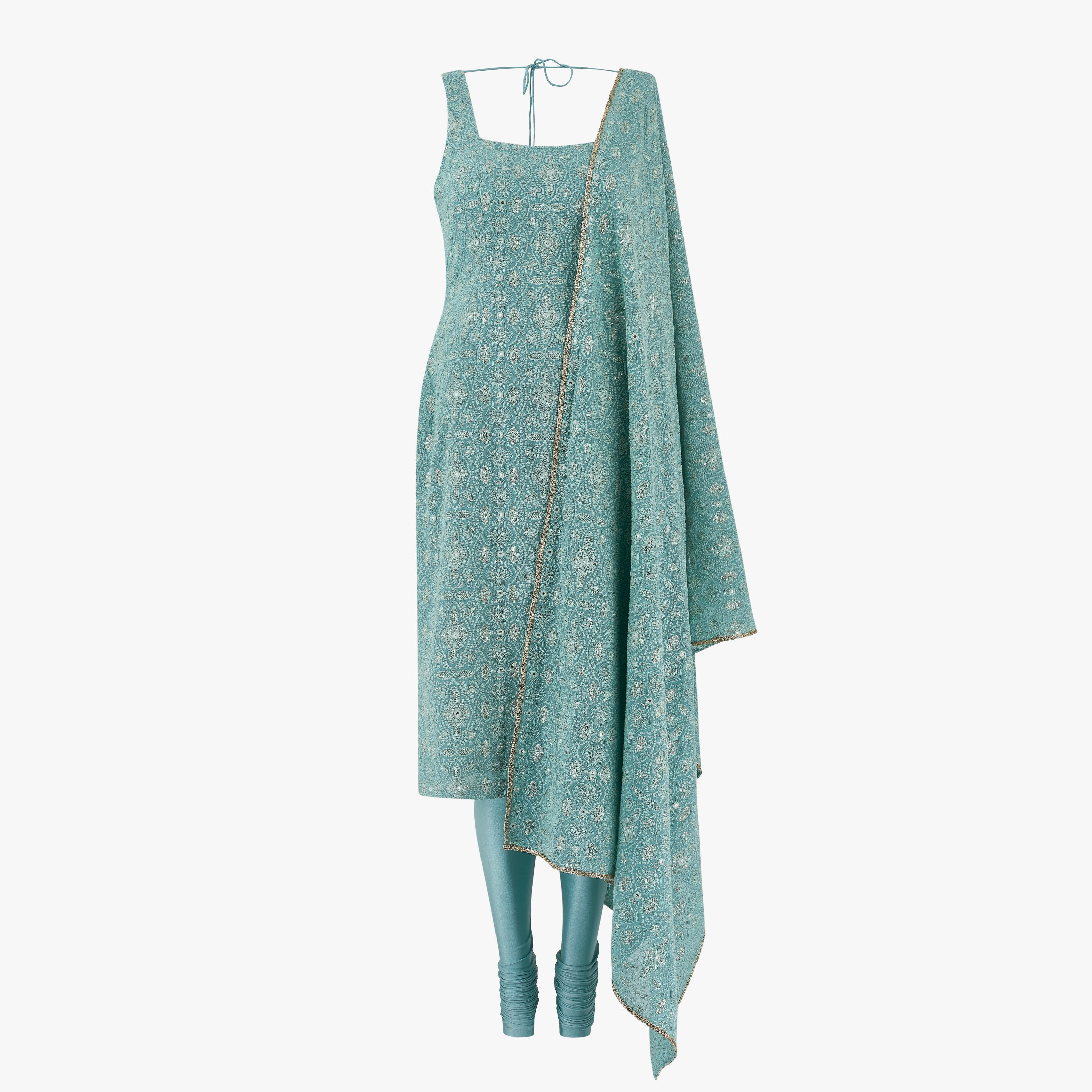 The Elsa chikan kari kameez set features a beautifully crafted kameez and dupatta paired with a comfortable lycra pajami, designed by Shenena Sethi