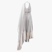 A modern halter cut grey satin anarkali dress with a wide mirrored border on the hem and an organza dupatta, designed by Shenena Sethi
