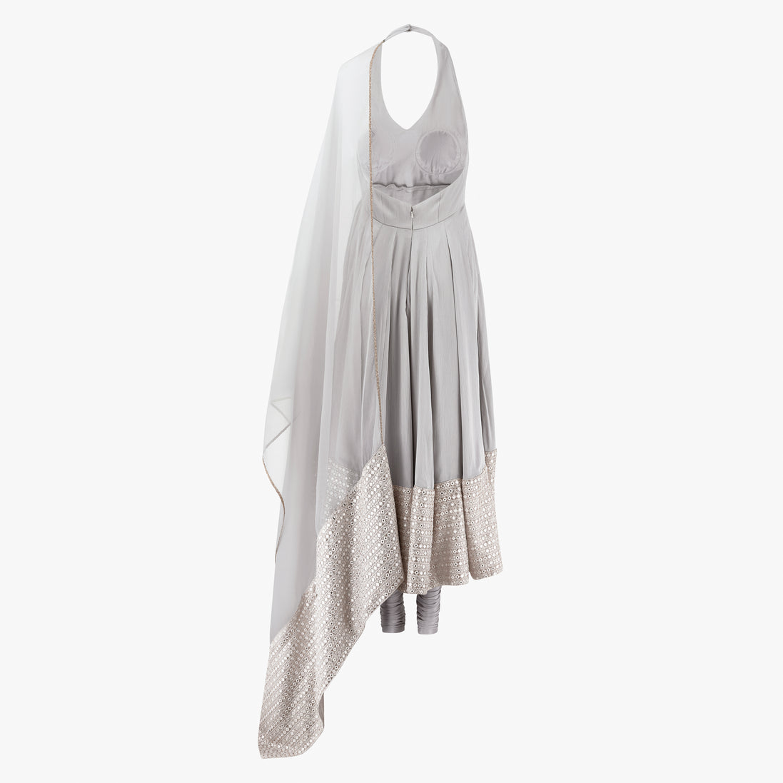 A modern halter cut grey satin anarkali dress with a wide mirrored border on the hem and an organza dupatta, designed by Shenena Sethi
