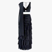 A black traditional outfit with sequin blouse and layered skirt with dupatta, designed by Shenena Sethi