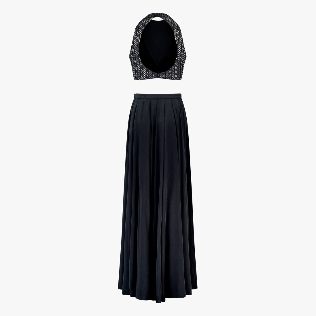 Lyla, a two-piece outfit with a mirror and thread work blouse and a georgette satin skirt in black, designed by Shenena Sethi