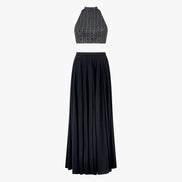 Lyla, a two-piece outfit with a mirror and thread work blouse and a georgette satin skirt in black, designed by Shenena Sethi