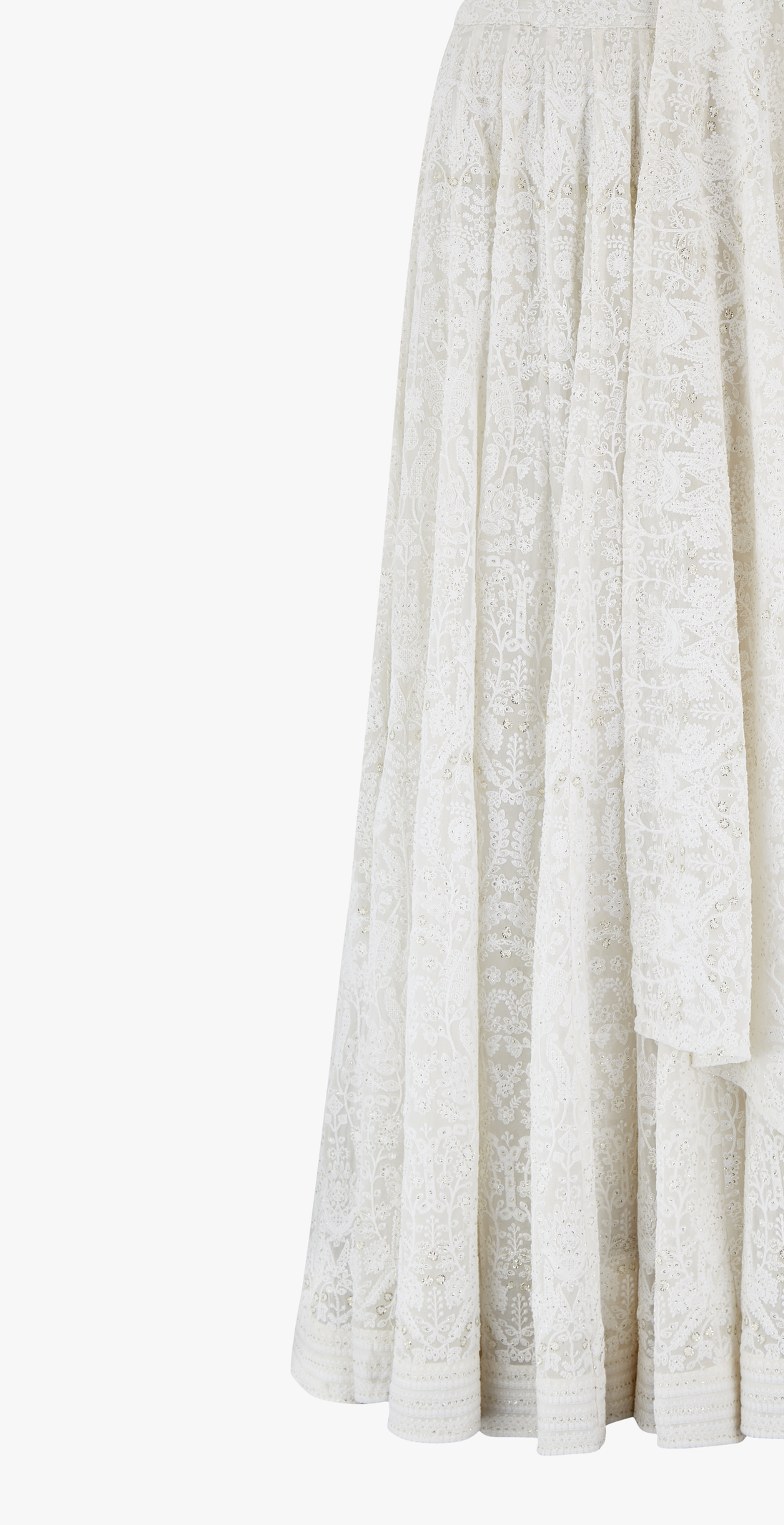 Chikan kari lehenga designed by Shenena Sethi, intricately embroidered with sequins and a plain semi raw silk top