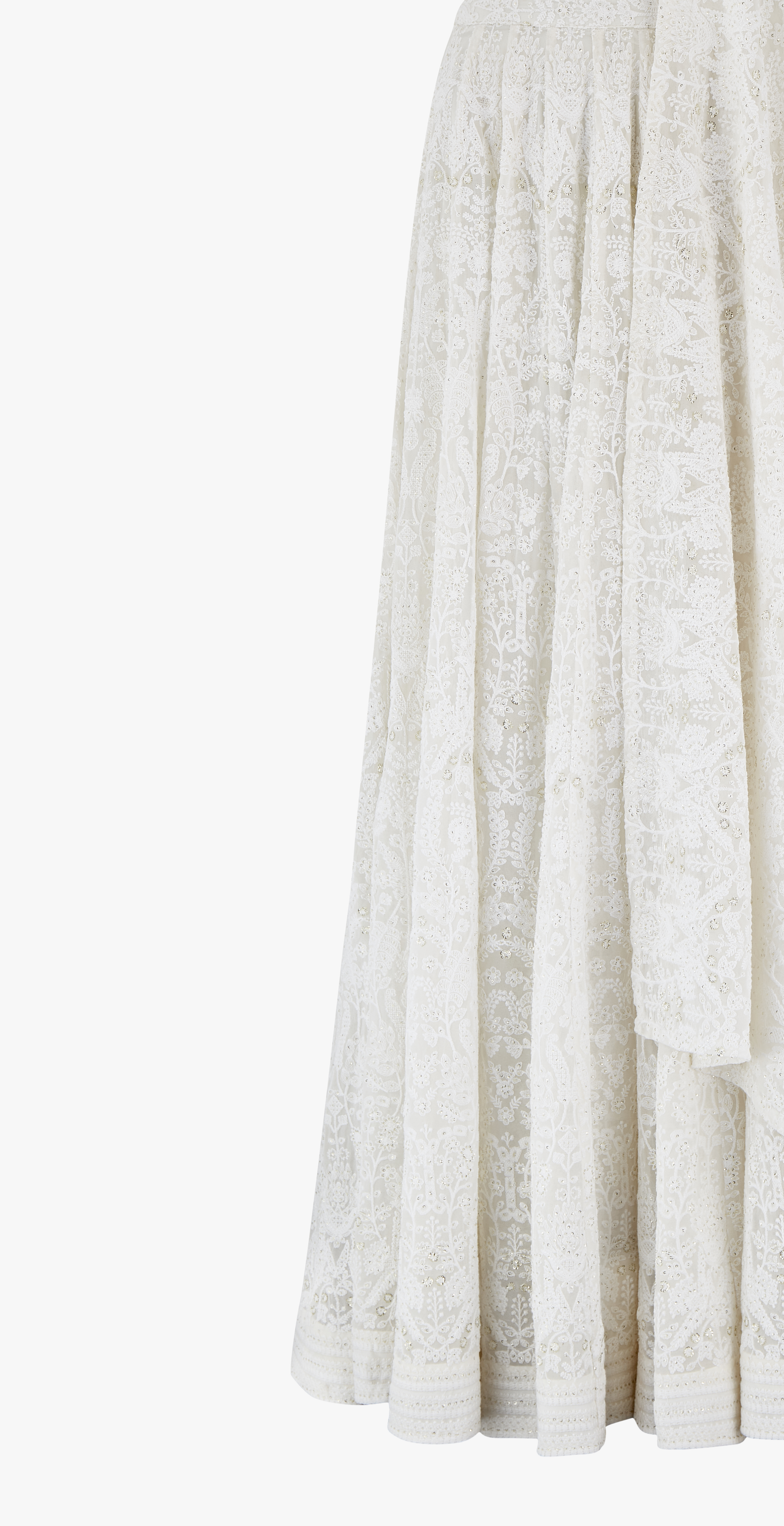 Chikan kari lehenga designed by Shenena Sethi, intricately embroidered with sequins and a plain semi raw silk top